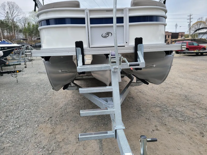 Slide: The Image of 2022 Barletta CORSA 25UC pontoon boat on a trailer, rear view. - 15