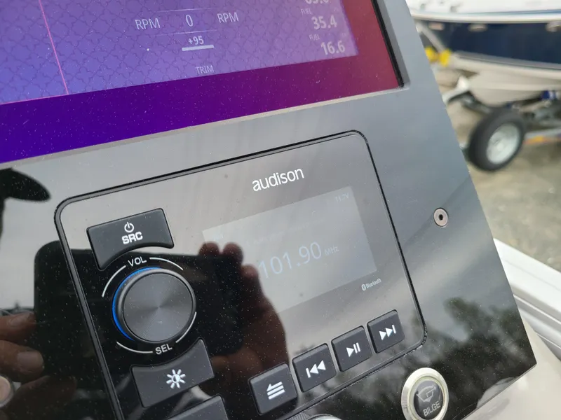 Slide: The Image of Close-up of 2022 Barletta CORSA 25UC dashboard with Audison audio system. - 34