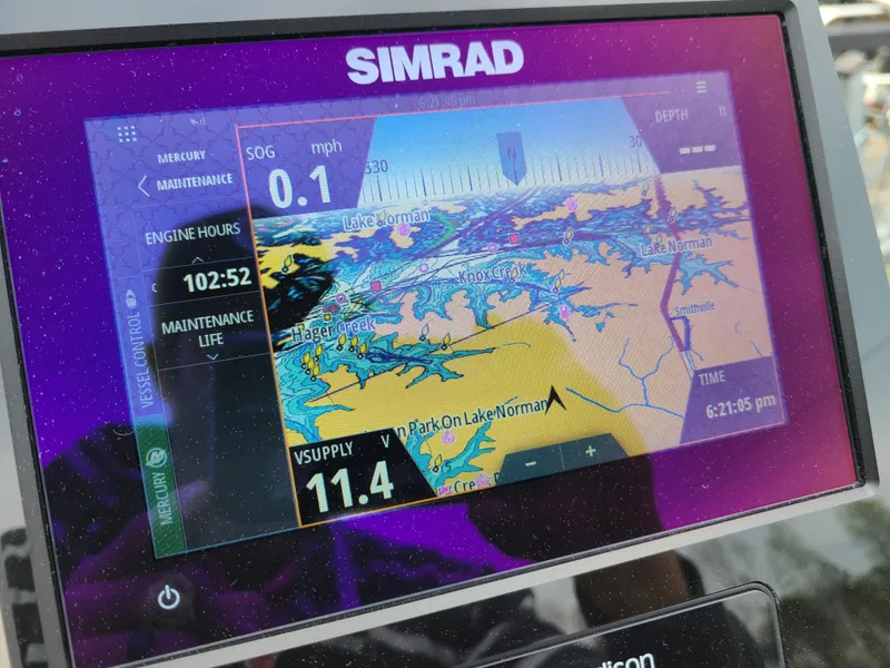 Slide: The Image of Simrad navigation display on a 2022 Barletta CORSA 25UC boat showing Lake Norman map. - 37