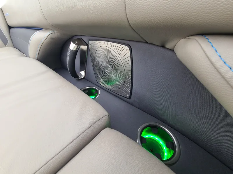 Slide: The Image of 2022 Barletta CORSA 25UC interior with illuminated cup holders and premium speaker. - 43
