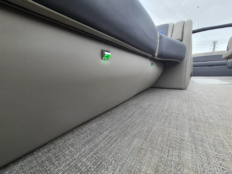 Slide: The Image of 2022 Barletta CORSA 25UC interior seating with green LED lights. - 45