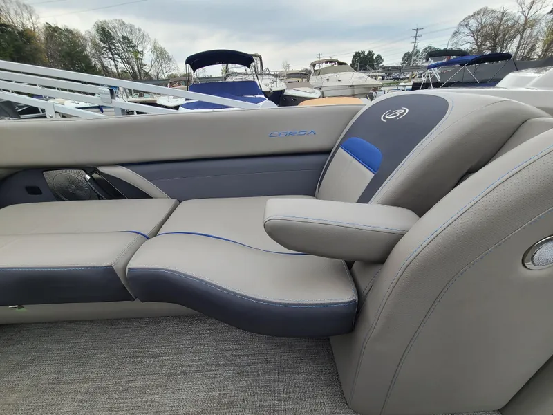 Slide: The Image of 2022 Barletta CORSA 25UC boat interior with luxurious seating and armrest. - 46