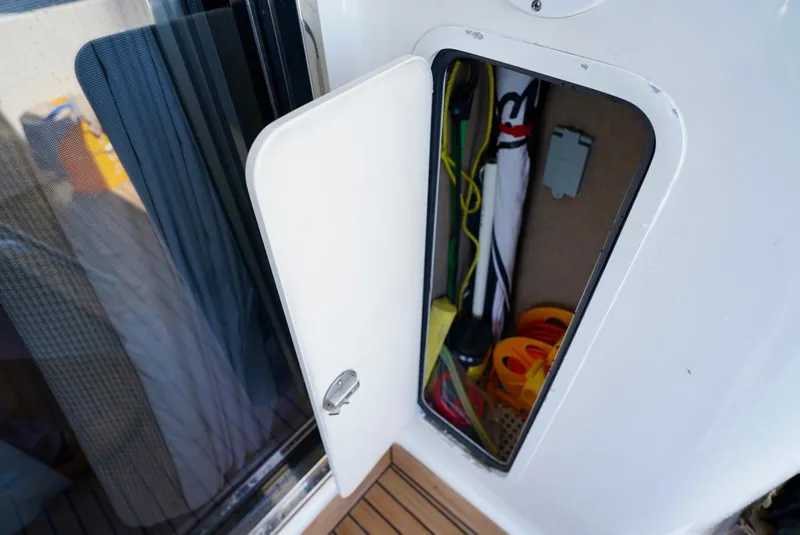 Slide: The Image of Storage compartment on a 2002 Sea Ray 480 Sedan Bridge yacht. - 22