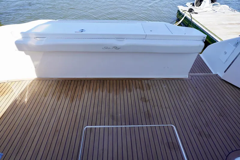 Slide: The Image of Teak deck of 2002 Sea Ray 480 Sedan Bridge yacht at dock. - 23