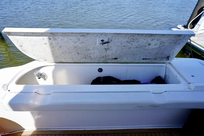 Slide: The Image of Open storage compartment on a 2002 Sea Ray 480 Sedan Bridge boat. - 24