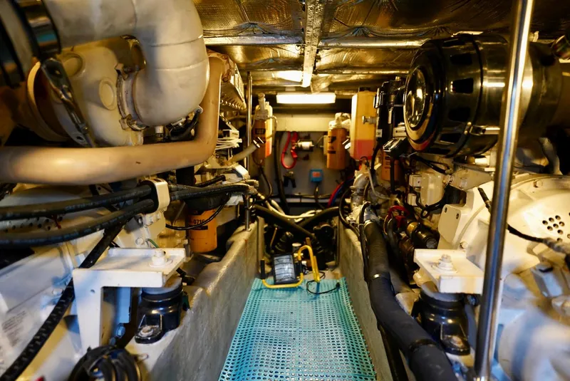 Slide: The Image of Engine room of a 2002 Sea Ray 480 Sedan Bridge yacht. - 46