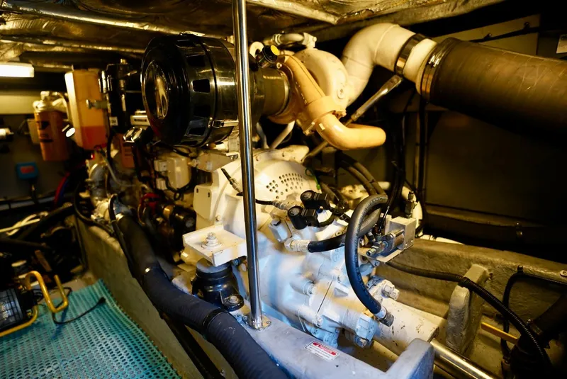 Slide: The Image of Engine room of a 2002 Sea Ray 480 Sedan Bridge yacht. - 49