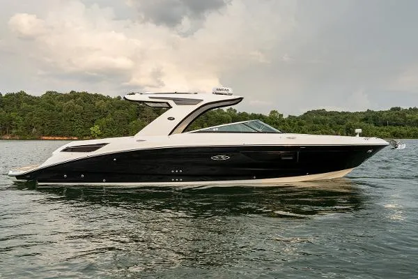 The Image of 2022 Sea Ray 350 SLX luxury boat on a serene lake. - 0