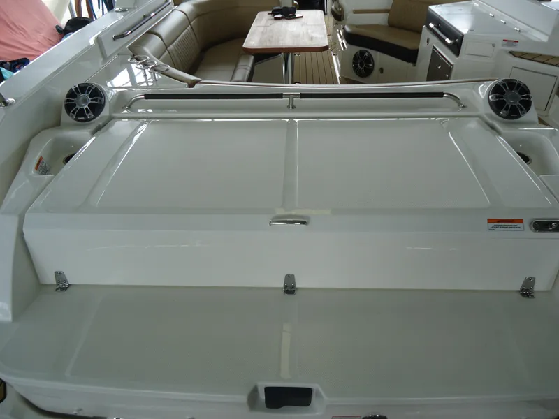 Slide: The Image of Interior of 2022 Sea Ray 350 SLX boat with seating and table. - 5