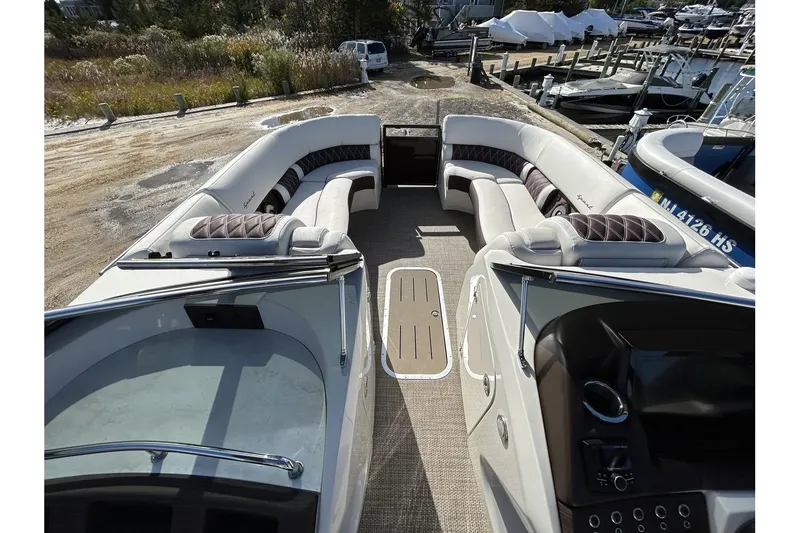 Slide: The Image of 2021 Bennington QX 25 Swingback boat interior with luxurious seating. - 12