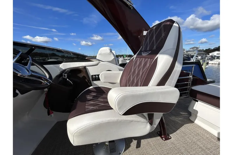 Slide: The Image of 2021 Bennington QX 25 Swingback captain's chair with luxurious upholstery. - 16