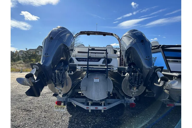 Slide: The Image of 2021 Bennington QX 25 Swingback with dual outboard motors, rear view. - 4