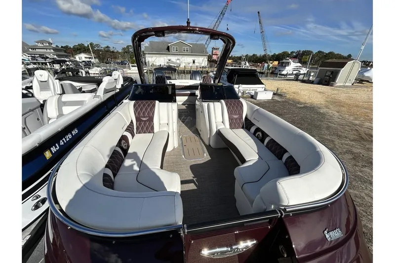 Slide: The Image of 2021 Bennington QX 25 Swingback pontoon boat with luxurious seating and modern design. - 6