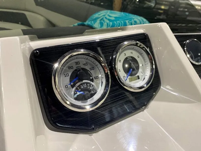 Slide: The Image of 2024 SunChaser Geneva 24 SB DH dashboard with speedometer and tachometer. - 19