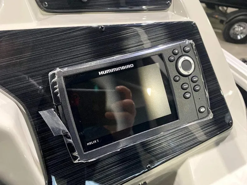 Slide: The Image of Humminbird Helix 5 fish finder on 2024 SunChaser Geneva 24 SB DH boat dashboard. - 20