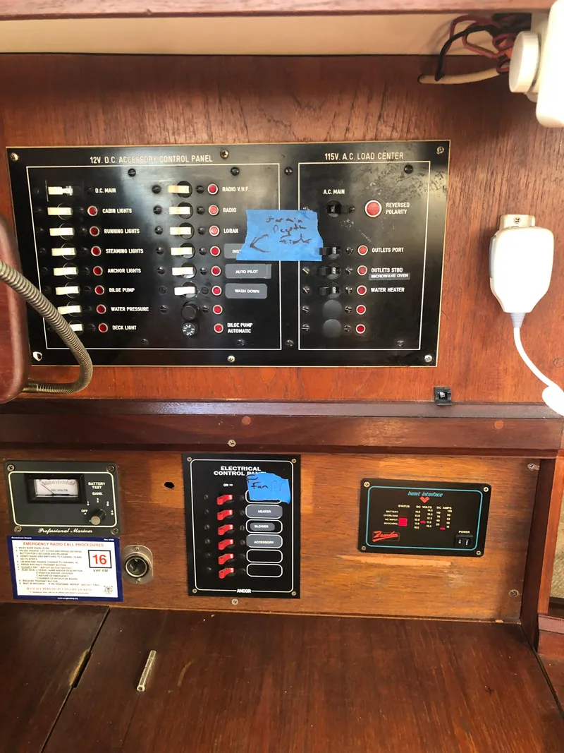 Slide: The Image of Electrical control panel on a 1983 Hunter 34 sailboat interior. - 24