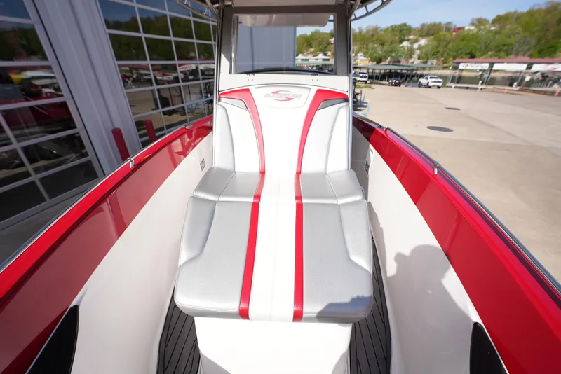 Slide: The Image of 2016 Sunsation 29 CCX boat with red and white seating. - 10
