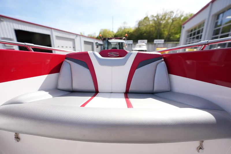 Slide: The Image of 2016 Sunsation 29 CCX boat interior with red and white seating. - 16