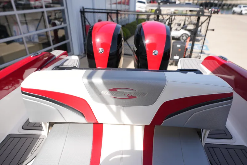Slide: The Image of 2016 Sunsation 29 CCX boat with red and white seating and twin engines. - 19