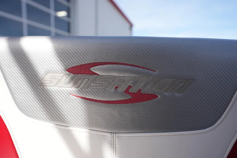 Slide: The Image of 2016 Sunsation 29 CCX boat seat with logo in sunlight. - 20