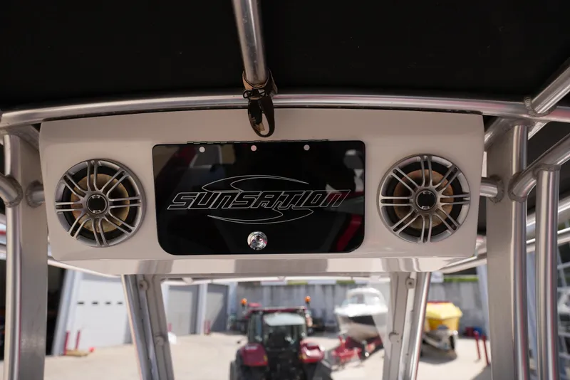 Slide: The Image of 2016 Sunsation 29 CCX boat speakers and logo on overhead console. - 6