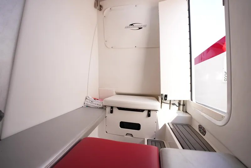 Slide: The Image of Interior cabin of 2016 Sunsation 29 CCX boat with seating and storage. - 8