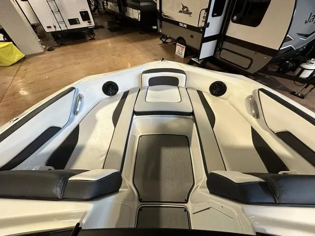 Slide: The Image of 2024 Yamaha Boats SX195 interior, spacious seating, modern design, and high-quality materials. - 10