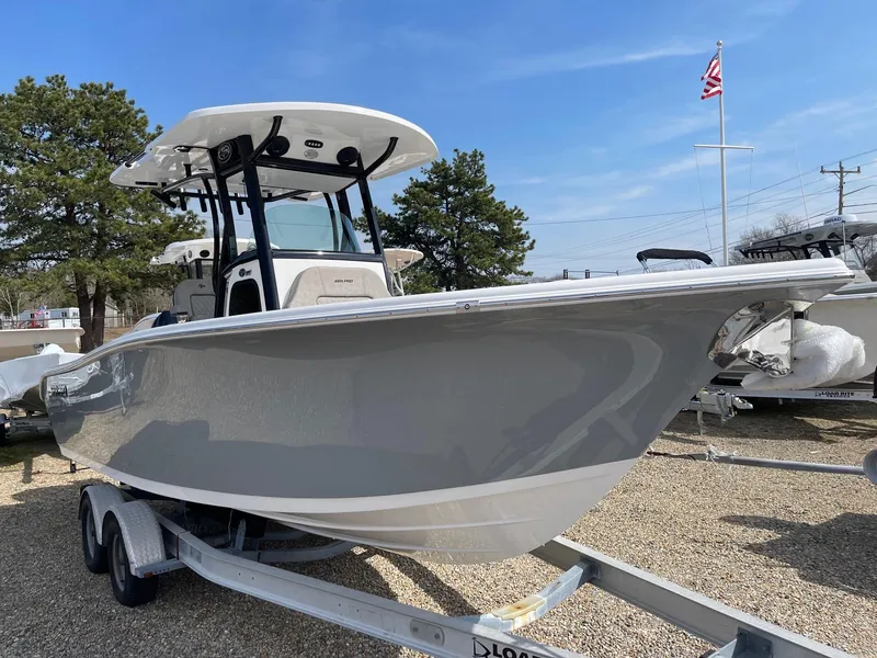 Slide: The Image of 2024 Sea Pro 242 Center Console boat on a trailer. - 3