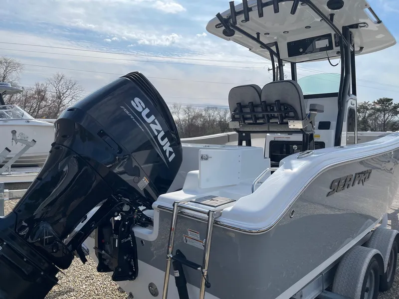 Slide: The Image of 2024 Sea Pro 242 Center Console boat with Suzuki outboard motor. - 4