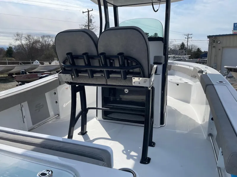 Slide: The Image of 2024 Sea Pro 242 Center Console boat interior with dual seats and console. - 6