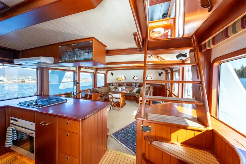 Slide: The Image of Interior of 2002 North Sea Trawler with wooden cabinetry and nautical decor. - 18