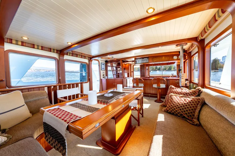 Slide: The Image of Luxurious interior of 2002 North Sea Trawler with elegant wood finishes and comfortable seating. - 2
