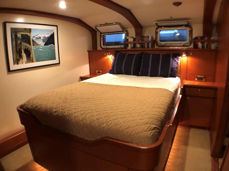 Slide: The Image of Luxurious cabin interior of 2002 North Sea Trawler with cozy bed and nautical decor. - 34