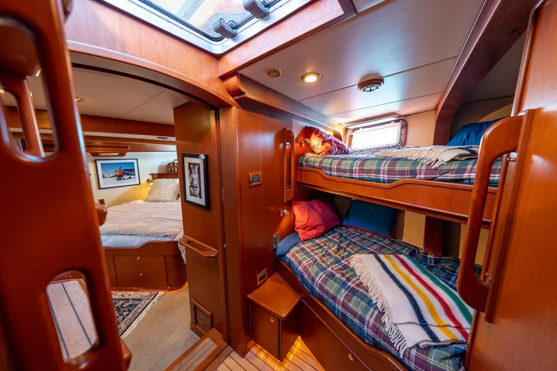 Slide: The Image of Cozy cabin interior of 2002 North Sea Trawler with bunk beds and warm wood finishes. - 40