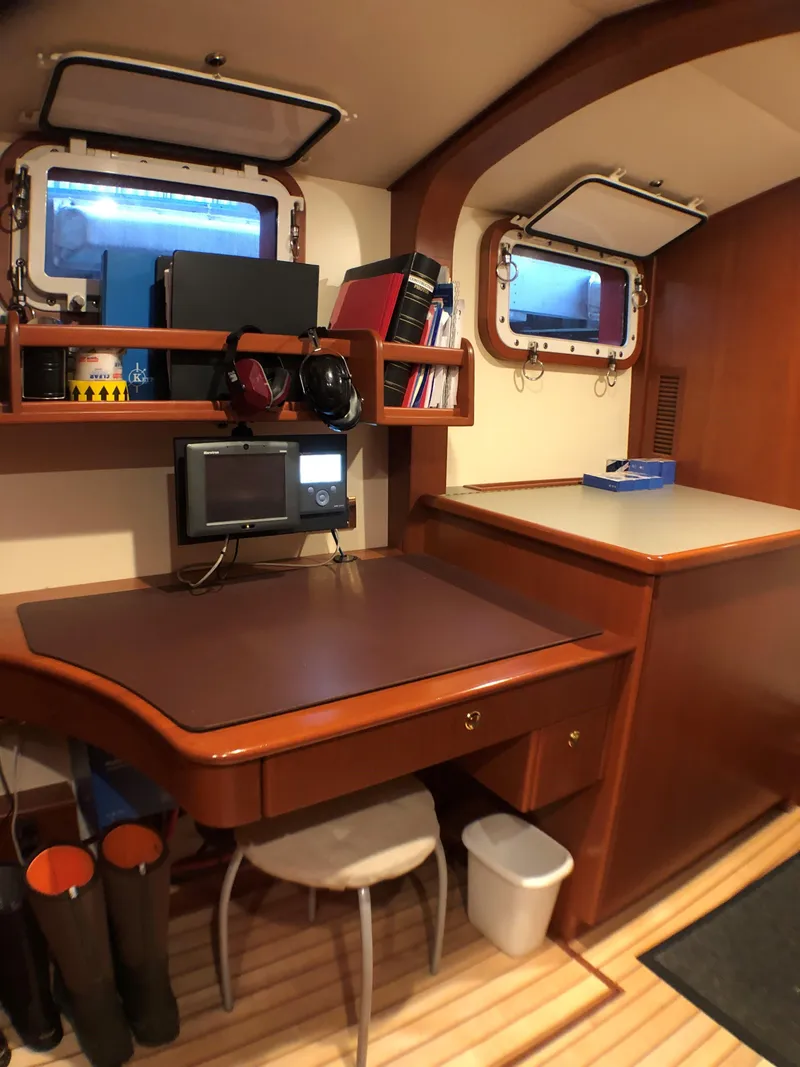 Slide: The Image of Cozy cabin interior of 2002 North Sea Trawler with desk, windows, and wooden furnishings. - 45