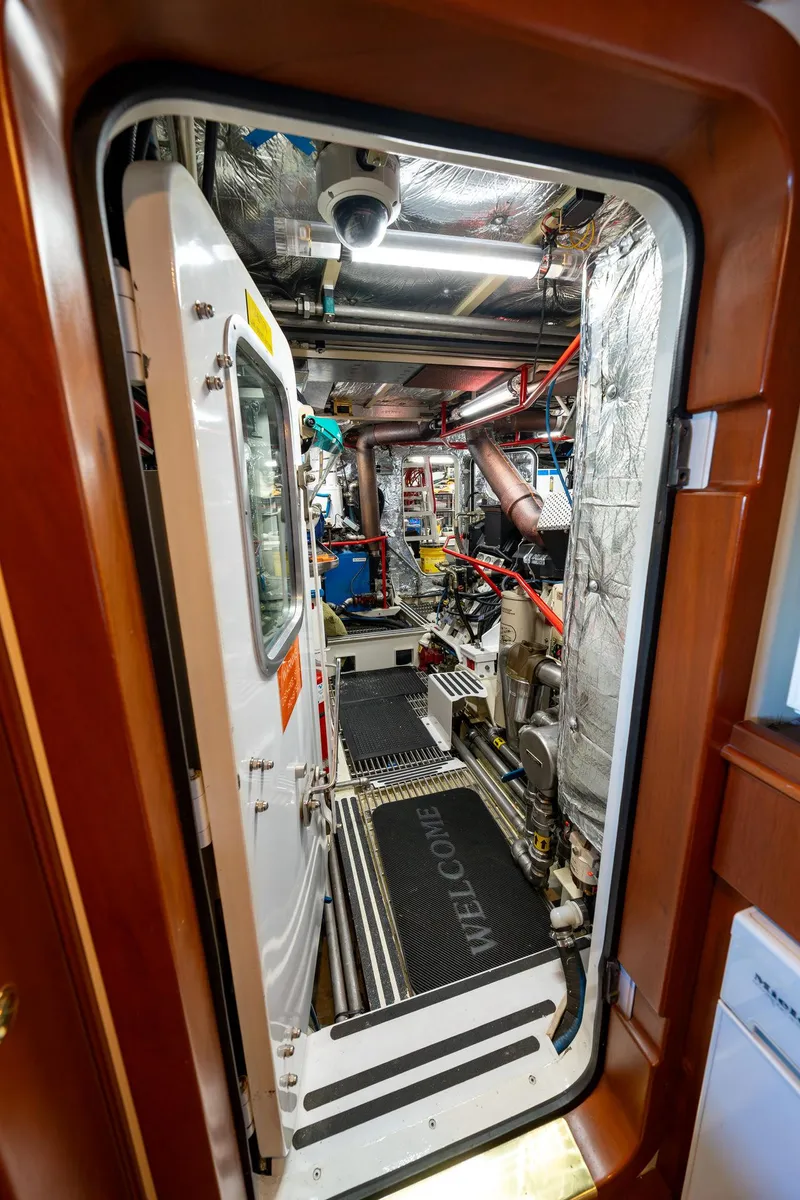 Slide: The Image of Engine room of a 2002 North Sea Trawler, showcasing machinery and equipment. - 47