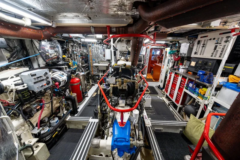 Slide: The Image of Engine room of a 2002 North Sea Trawler, featuring complex machinery and equipment. - 48