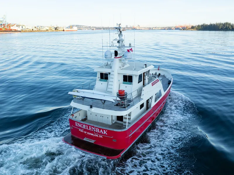 Slide: The Image of North Sea Trawler 2002 navigating calm waters, rear view with visible deck and equipment. - 5