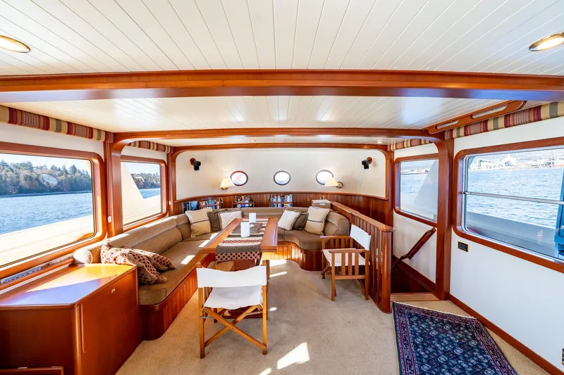 Slide: The Image of Luxurious North Sea Trawler 2002 interior with elegant wood finish and comfortable seating. - 8