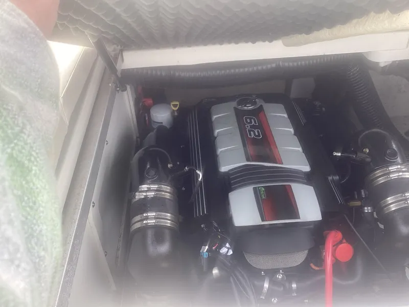 Slide: The Image of Engine compartment of a 2017 Sea Ray SDX 270 boat, featuring a 6.2-liter engine. - 14
