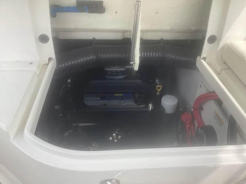 Slide: The Image of Engine compartment of 2017 Sea Ray SDX 270 boat, showcasing internal components. - 16