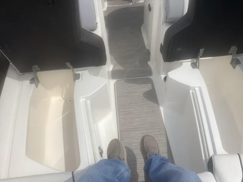Slide: The Image of 2017 Sea Ray SDX 270 interior with seating and flooring details. - 19