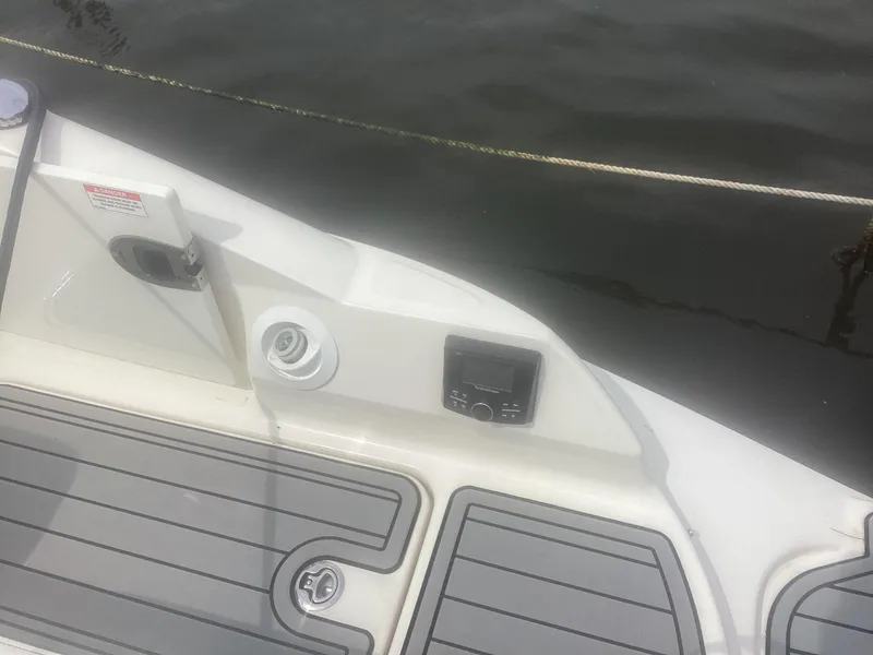 Slide: The Image of 2017 Sea Ray SDX 270 boat deck with water view. - 23