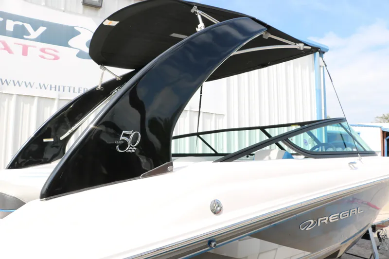 Slide: The Image of 2021 Regal 2000 ESX Bowrider boat with black arch and 50th anniversary logo. - 17