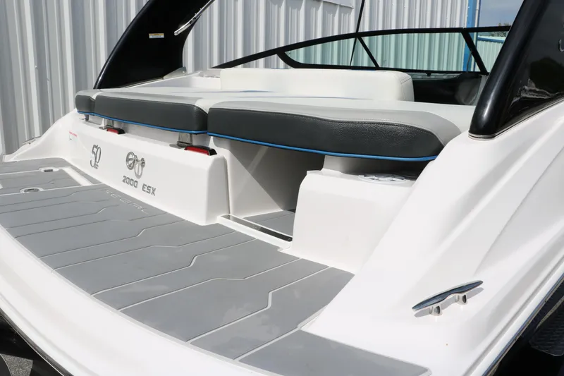 Slide: The Image of 2021 Regal 2000 ESX Bowrider boat, rear seating and deck view. - 18