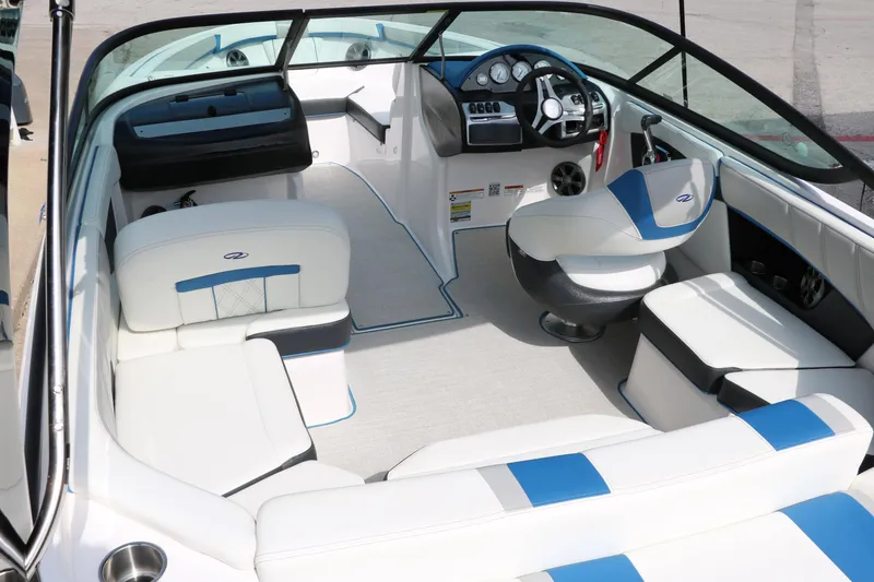 Slide: The Image of 2021 Regal 2000 ESX Bowrider interior with white and blue seating. - 19