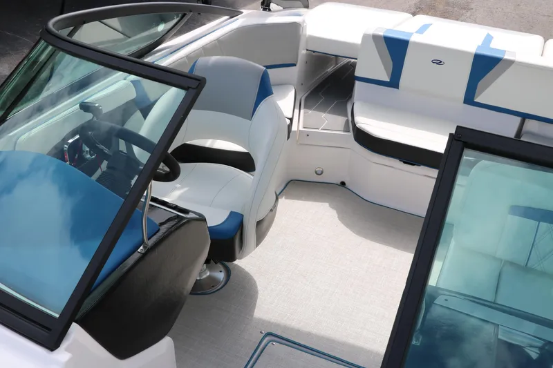 Slide: The Image of 2021 Regal 2000 ESX Bowrider interior with seating and steering wheel. - 26