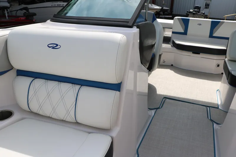 Slide: The Image of 2021 Regal 2000 ESX Bowrider interior with white and blue seating. - 27