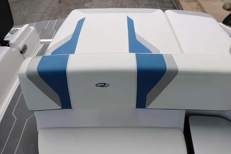 Slide: The Image of 2021 Regal 2000 ESX Bowrider boat seat with blue and gray accents. - 37