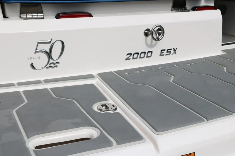 Slide: The Image of 2021 Regal 2000 ESX Bowrider boat rear deck and logo. - 45